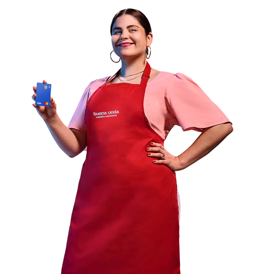 Tide business owner holding a Tide card