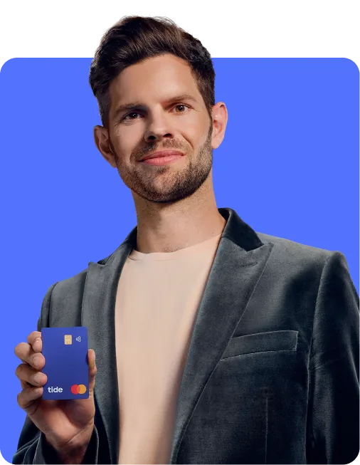 Tide business owner holding a Tide card